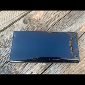 Vintage clutch with metal handle